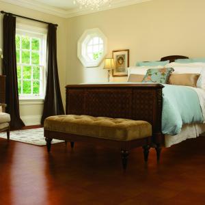 Room scene with Torlys leather plank flooring in Modena Wine