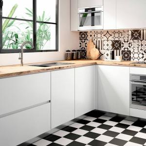 Kitchen renovation with Patchwork tile collection in assorted black & white patterns