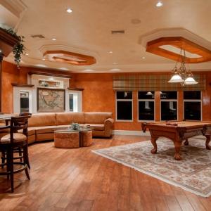 Room scene with hardwood floors and beautiful Persian-style area rug