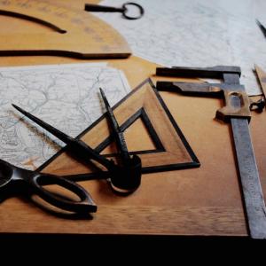 Drafting table with vintage design tools