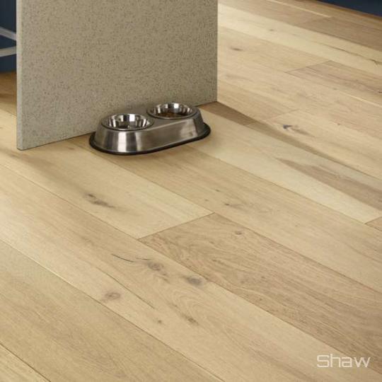 Room scene with Exquisite waterproof engineered hardwood flooring from Shaw, in Flaxen Oak