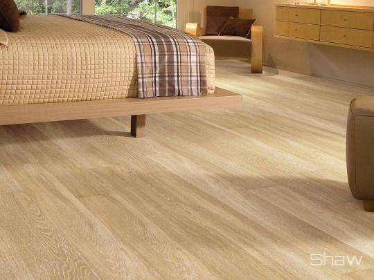 Room scene with World's Fair luxury vinyl flooring by Shaw, in Paris