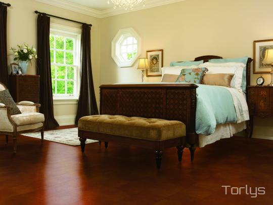 Room scene with Torlys leather plank flooring in Modena Wine