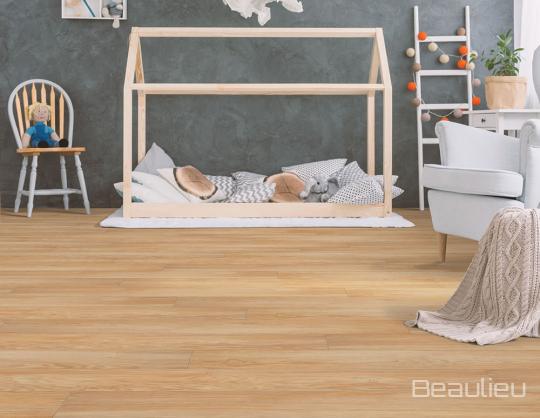 Room scene with GalaxÄ« II Collection laminate flooring in Triangulum