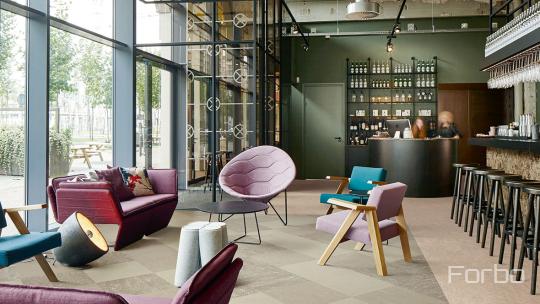 Room scene with Marmoleum Modular flooring in multiple colours
