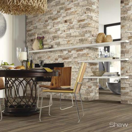 Room scene with Firestone Split Face stone tile by Shaw, in Picasso