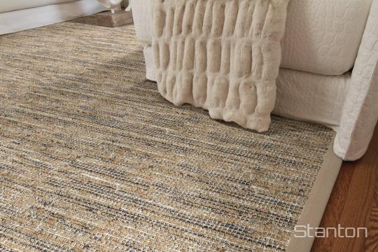 Room scene with Mendoza jute-blend rug from Stanton, in Indigo
